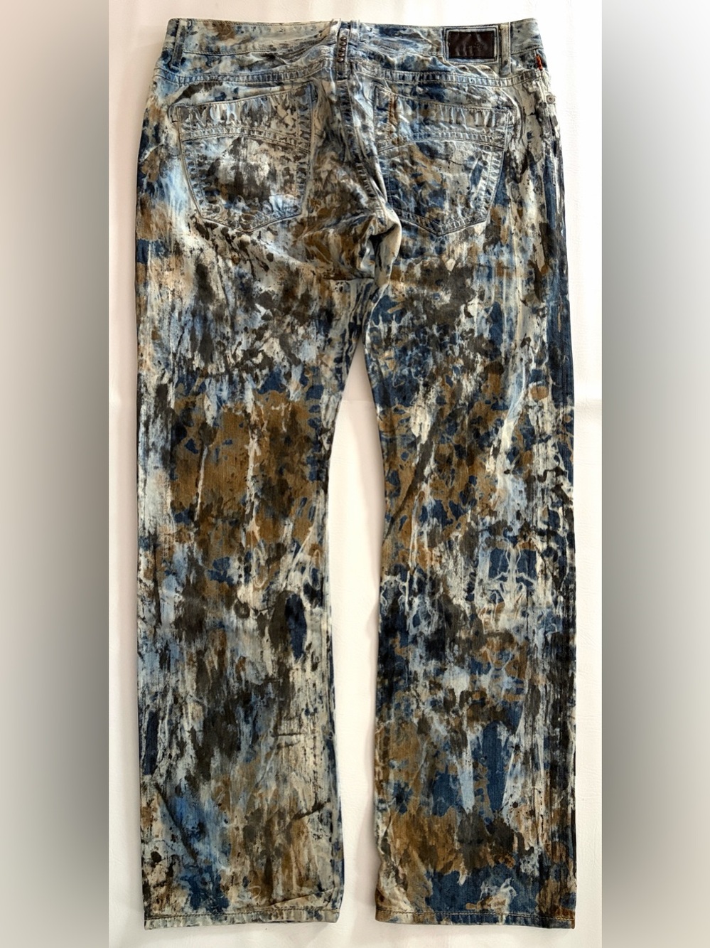 Robin’s Jean Denim Paint Splatter Print
Sty#D547 1IND Marlon Straight Studs 42